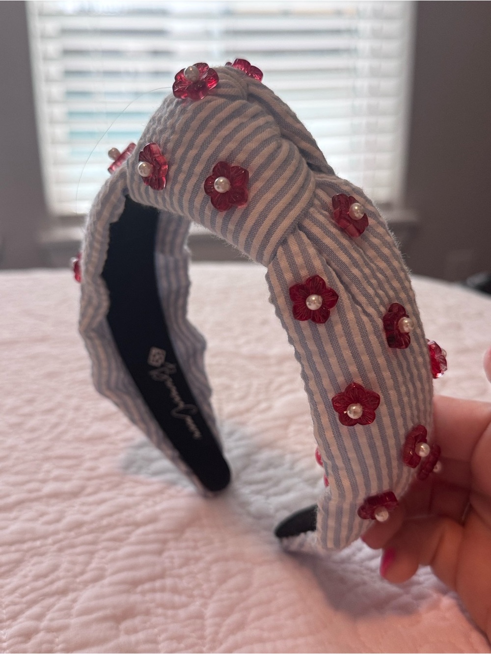 Brianna Cannon Striped Blue Headband with Red Flower Embellishments